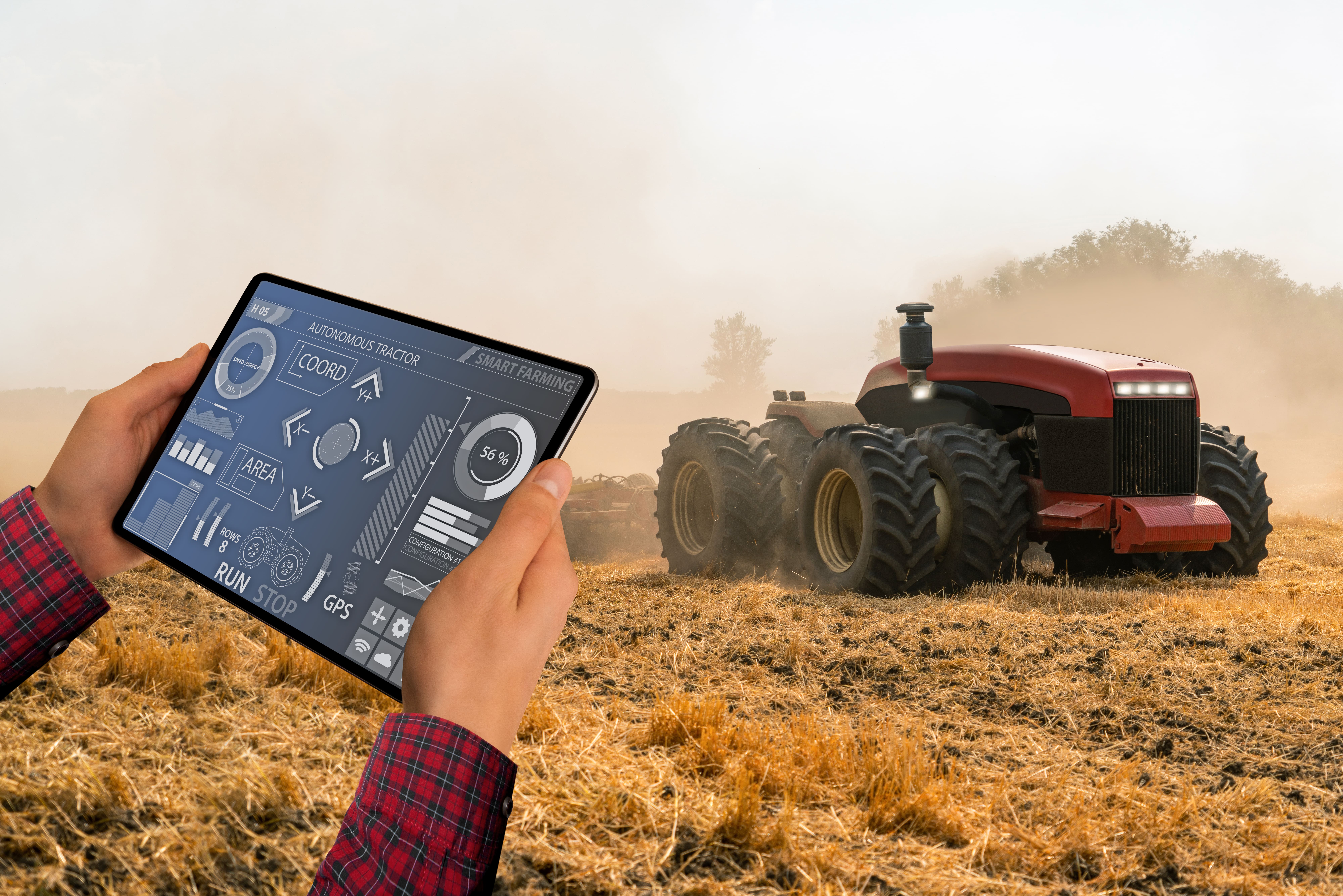 farmer digital tablet controls autonomous tractor