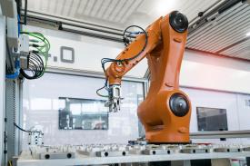 Six axis robotics automating material handling operations