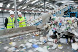 Recycling robots observed by two workers