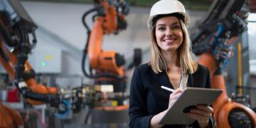 Female chief engineer in modern industrial factory