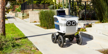 Food delivery robot on pavement