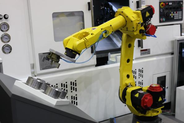 Industrial CNC robot for machine tending