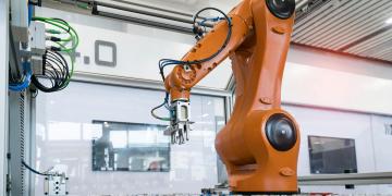 Six axis robotics automating material handling operations